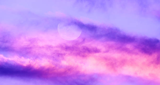 istock Sunset Moon Inspirational Ethereal Surreal Sky Cloudscape Clouds Scenic Banner Header 2219388751