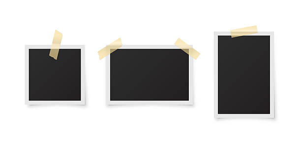 istock Blank retro photo frames with tape. Set of empty vintage photo placeholders with white borders on white background. Scrapbook or memory album templates. Realistic vector illustration 2219390960