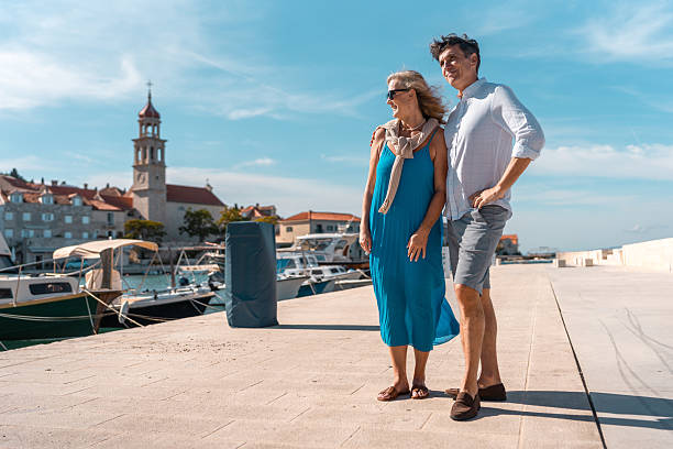 istock Mature Couple Exploring Sutivan Coastal Town 2219392604