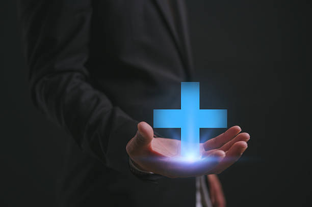 istock Businessman hand holding plus icon in concept of positive thinking personal development mindset or healthcare insurance, like benefits, personal development, health insurance, growth concept 2219395519