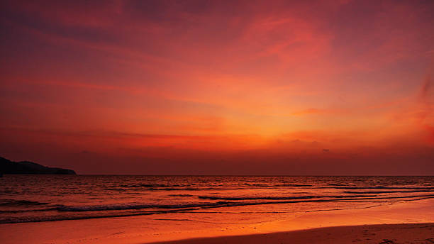 istock Sky background of sunset on beach sea 2219402504