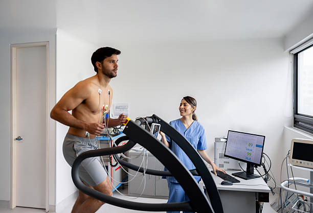 istock Man running on a treadmill while doing a stress test at a sports training clinic 2219405162
