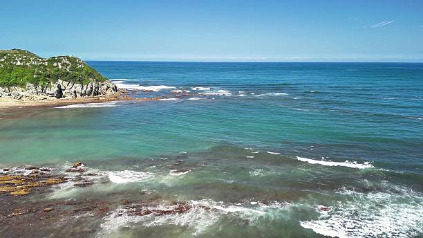 istock A Beautiful and Tranquil Coastal Landscape featuring Calm Waters and Lush Verdant Greenery 2219407195
