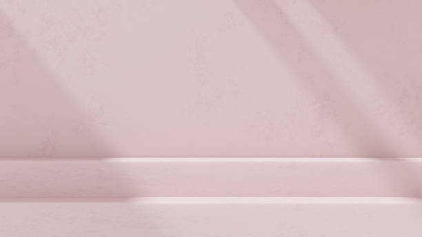 istock Background featuring an empty product display mockup with a pink backdrop and abstract geometric platforms designed for showcasing merchandise in landscape orientation. 2219407381