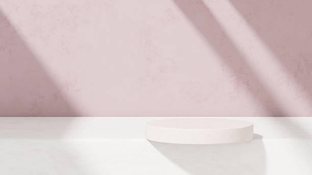 istock Background featuring an empty product display mockup with a pink backdrop and abstract geometric platforms designed for showcasing merchandise in landscape orientation. 2219407382