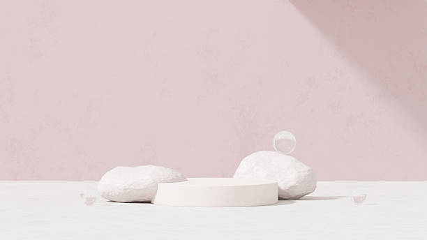 istock Background featuring an empty product display mockup with a pink backdrop and abstract geometric platforms designed for showcasing merchandise in landscape orientation. 2219407397