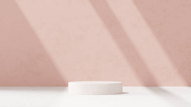 istock Background featuring an empty product display mockup with a pink backdrop and abstract geometric platforms designed for showcasing merchandise in landscape orientation. 2219407839