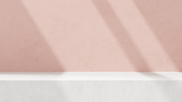 istock Background featuring an empty product display mockup with a pink backdrop and abstract geometric platforms designed for showcasing merchandise in landscape orientation. 2219407852