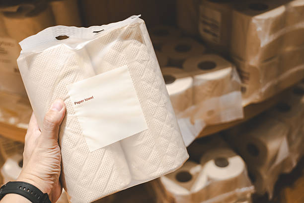 istock Bamboo Paper Towel Roll. Eco Friendly, Soft and Sustainable Alternative for a Greener Future. Stack of Brown tissue paper pack. 2219410152