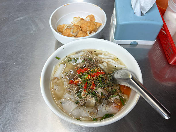 istock Wide Rice Noodles in Pork Bone Broth Soup 2219412905