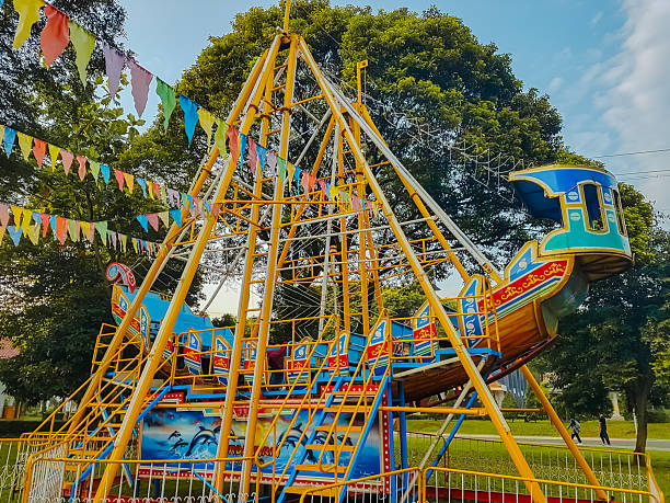 Jakarta, Indonesia - May 29, 2025 : Kora - Kora or pirate ship ride. one of amusement park for children