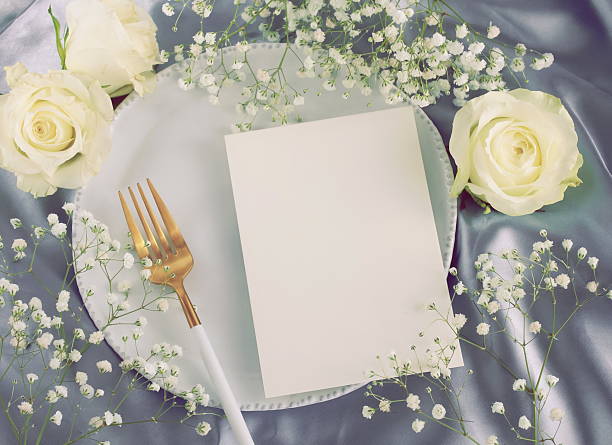 istock Greeting card mockup, menu blank mock up, wedding card, wedding invitation on table place setting 2219415936