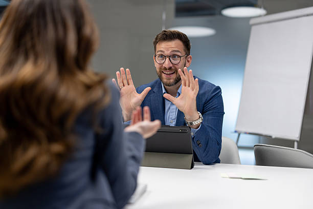 istock Enthusiastic businessman gesturing during a meeting in the office 2219417589