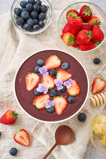 Acai bowl with strawberries and blueberries