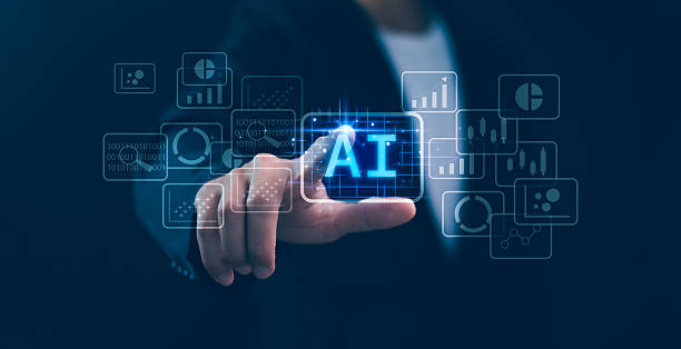 istock Concept of artificial intelligence in business. Hand interacts with a glowing AI symbol and various business icons, AI solutions, business automation, and the future of work. Future technology. 2219417820