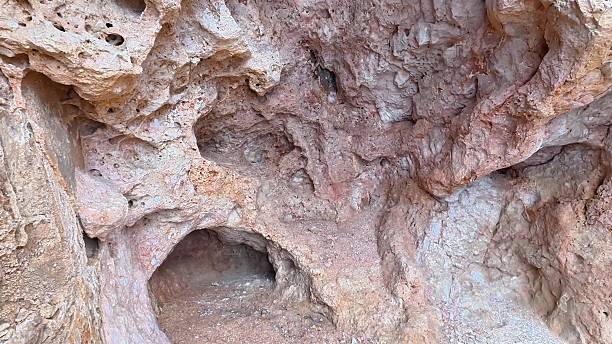 istock Embark on an adventure to explore stunning rock formations with unique textures and cavities 2219421706