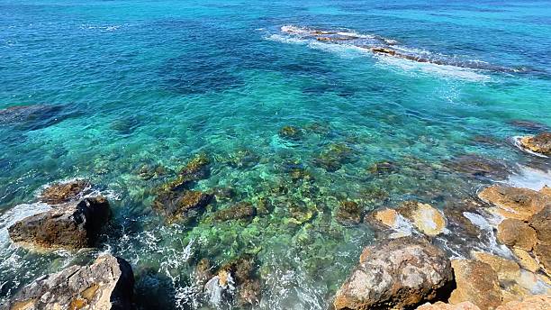 istock A stunning coastal seascape features clear turquoise waters alongside a beautiful rocky shoreline 2219422291
