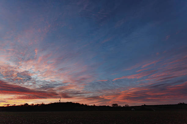 istock Majestic Sunrise Casting a Warm Glow Over the Hills 2219424996