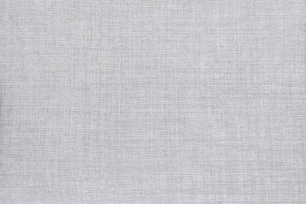 istock White grey linen fabric cloth texture for background, natural textile pattern. 2219425750