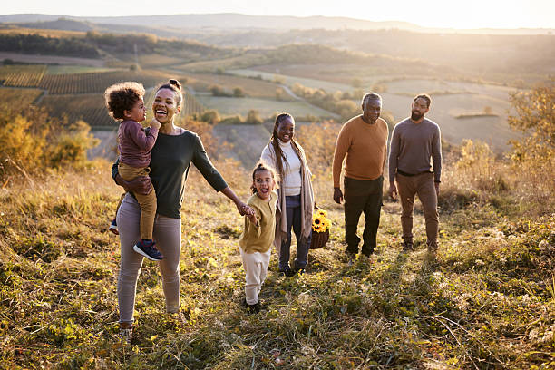 istock Happy black multi-generation family walking in autumn day. 2219426247