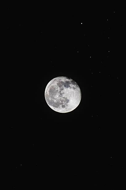istock Detailed moon view with stars in night sky. 2219430153