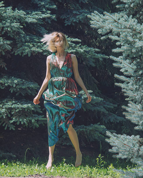 istock young beautiful woman in action at nature 2219430192