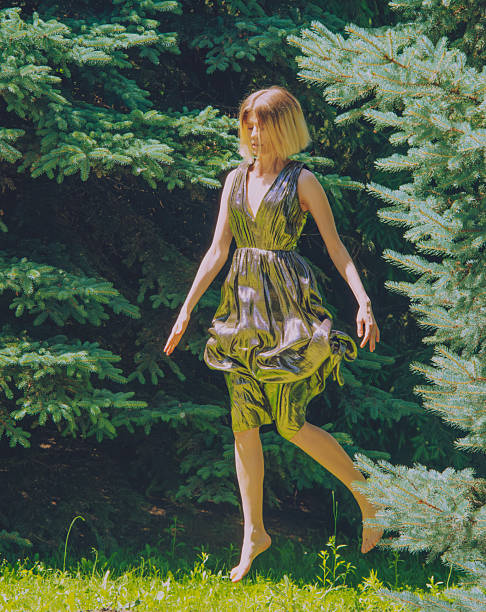 istock young beautiful woman in action at nature 2219430199
