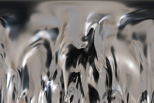 istock This abstract background features a fluid metallic surface in chrome, creating a futuristic feel. Ideal for tech-themed designs and promotional materials, it showcases flowing silver textures 2219430984
