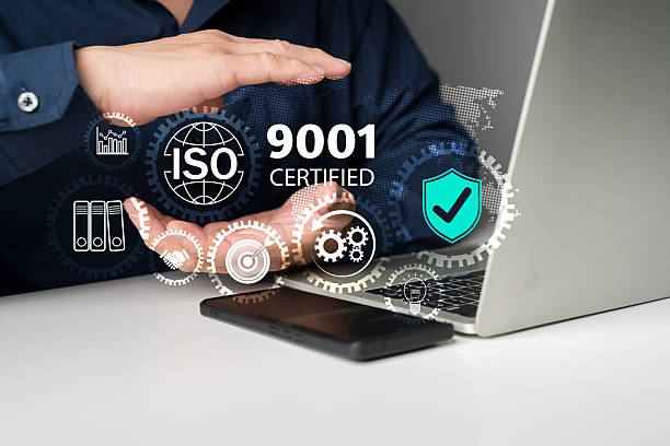 istock ISO 9001 certified quality management system concept with digital icons and business process on laptop screen 2219433029