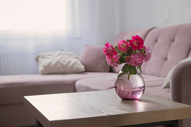 istock cozy interior with pink roses in glass vase 2219434862