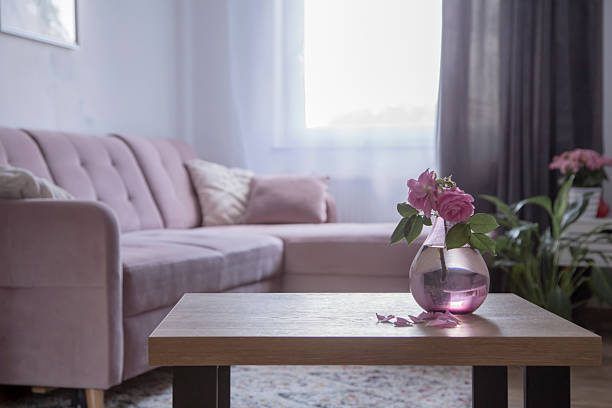 istock living room with pink sofa and flowers 2219434870