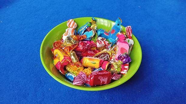 A vibrant bowl of mixed candies, ideal for promotional images or web content on sweets and treats.