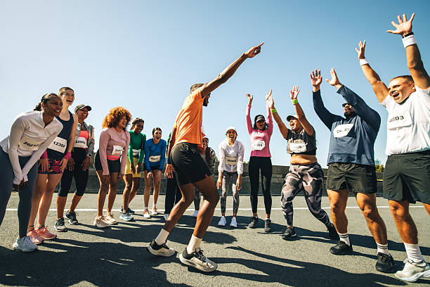 istock Cheerful group participating in a vibrant marathon event 2219446242