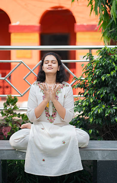 istock Mindfulness and Inner Peace – Woman Meditating Outdoors 2219447155