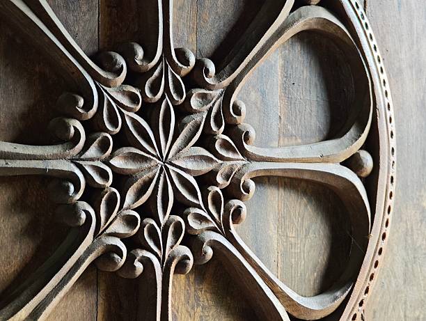 istock Intricate floral wood carving decorating a wooden surface 2219450558