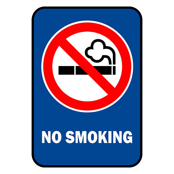 istock no smoking sign with burning cigarettes and smoke prohibition and risk illustration with warning text and blue background 2219452621