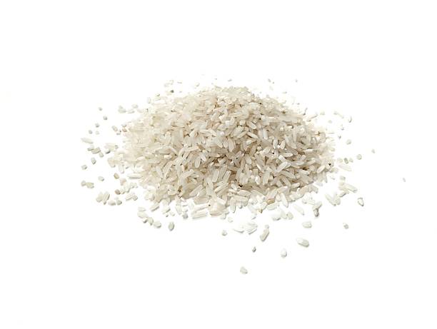 istock Pile of rice grain isolated on white background 2219457299