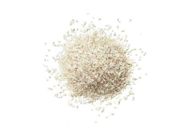 istock Pile of rice grain isolated on white background 2219457300