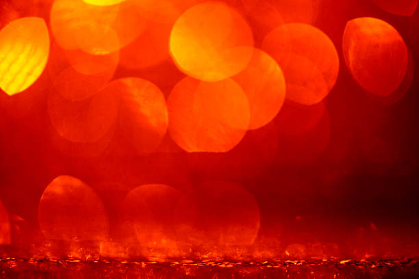 This softly defocused abstract background highlights glowing orange color bokeh blended with glitter and a soft shiny effect. Perfect for Thanksgiving - Holiday, party - social event, and romantic designs such as anniversary or wedding invitations. Includes flexible copy space for use in slide show or web banner applications.