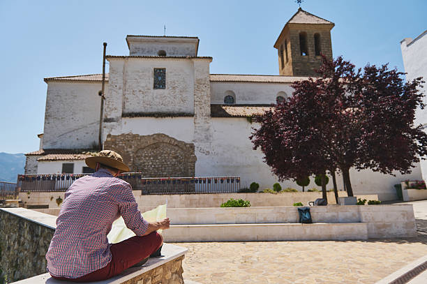 istock Traveler Exploring a Scenic Spanish Village and Mountains 2219460572