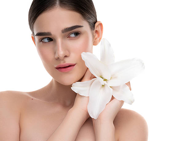 Beautiful brunet woman portrait and flowers