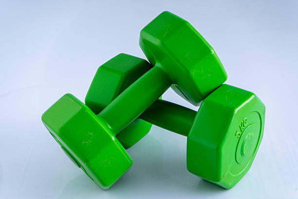 istock Two dumbbells 2 kg each. Sports equipment exercise. White background. 2219462792