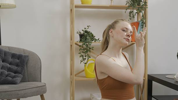 istock Young woman dancing in a bright apartment 2219471389