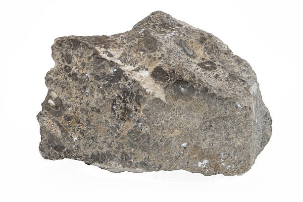 istock Close-up of basalt mineral, isolated on white background 2219477264