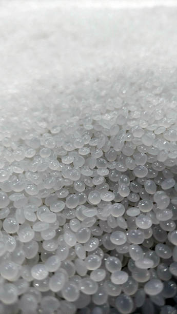 istock Close-Up of Clear Plastic Pellets  Raw Polymer Granules for Industrial Use 2219480208