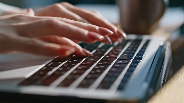 istock Gentle hands typing keyboard laptop at office closeup. Unrecognizable freelancer 2219481558