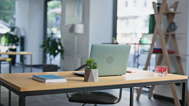 istock Modern coworking workspace laptop on wooden desk closeup. Organized work table 2219482390