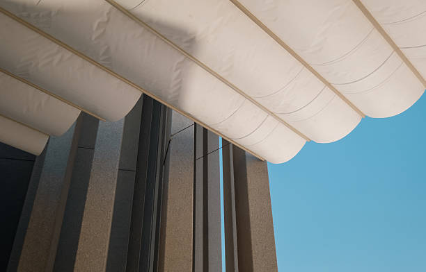 istock Modern Architectural Detail with White Canopy and Blue Sky 2219487350