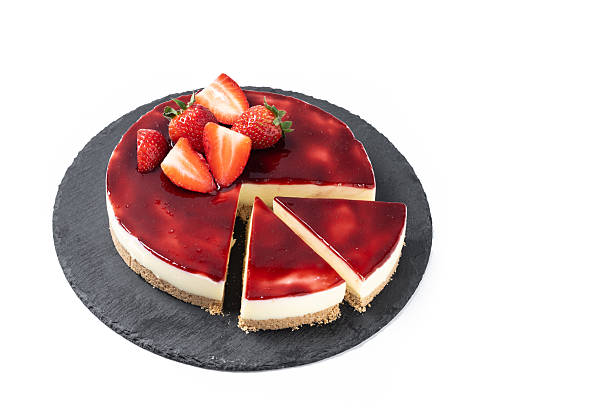 istock Cheesecake with strawberries isolated on white background 2219491546