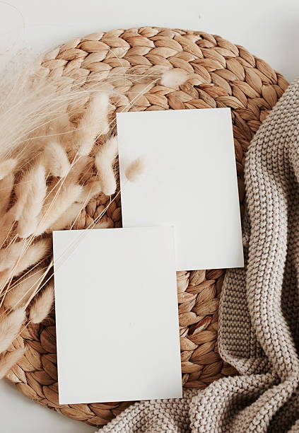 istock Cards mockup empty blank paper and dry flowers in boho style background top view flat lay. 2219491915